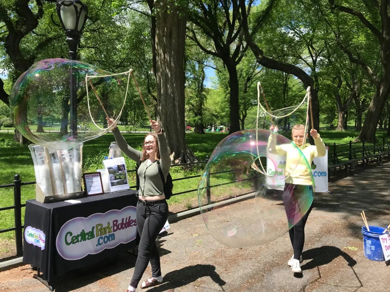 Interactive bubble setup in Central Park with participants creating giant bubbles